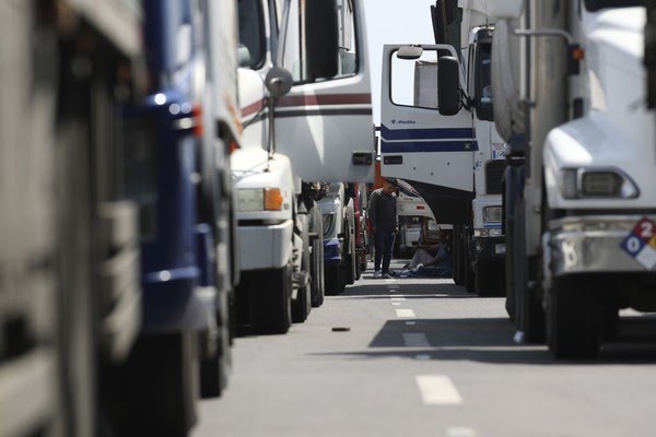  Onda de greves coloca pressão sobre cadeias de suprimentos globais